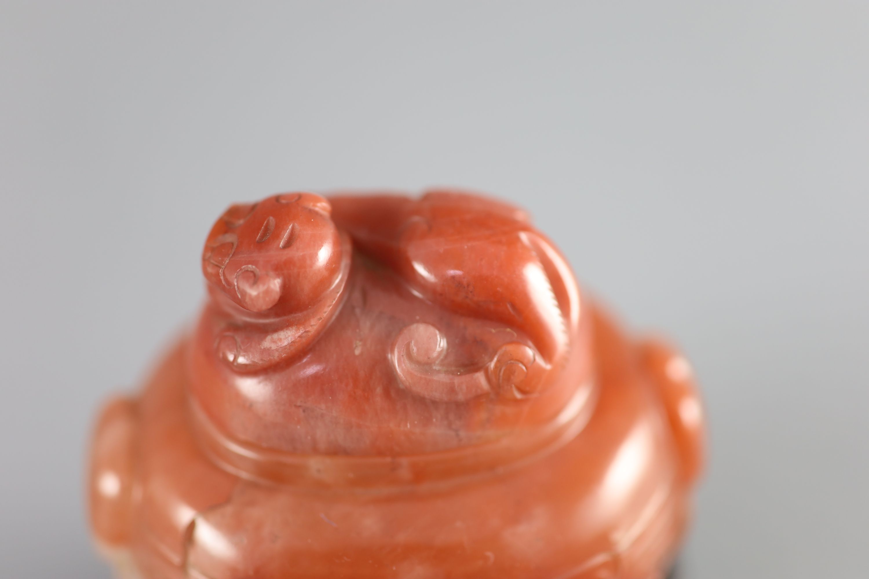 A small Chinese cornelian jar and cover, Qing dynasty, 18th/19th century, height 2.5in.